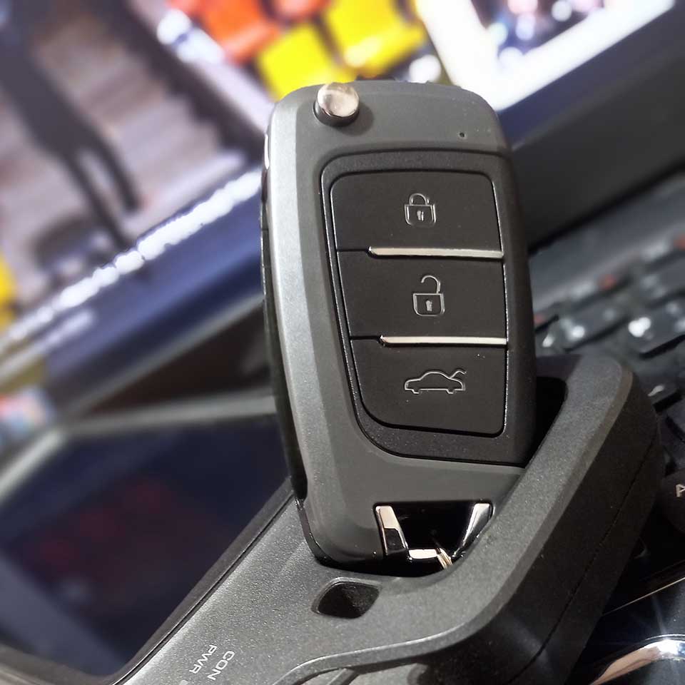 Keys with remotes, key programming devices, smart keys, and code keys from inside and outside the car.